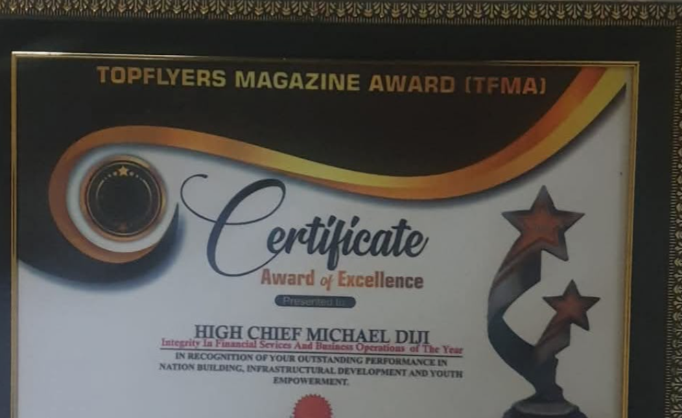 High Chief Michael Diji receiving the TopFlyers Integrity Award